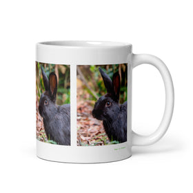 11 oz. white ceramic riverine rabbit mug showing a riverine rabbit in its natural habitat