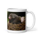 11 oz. white ceramic mole mug showing a mole in its natural habitat