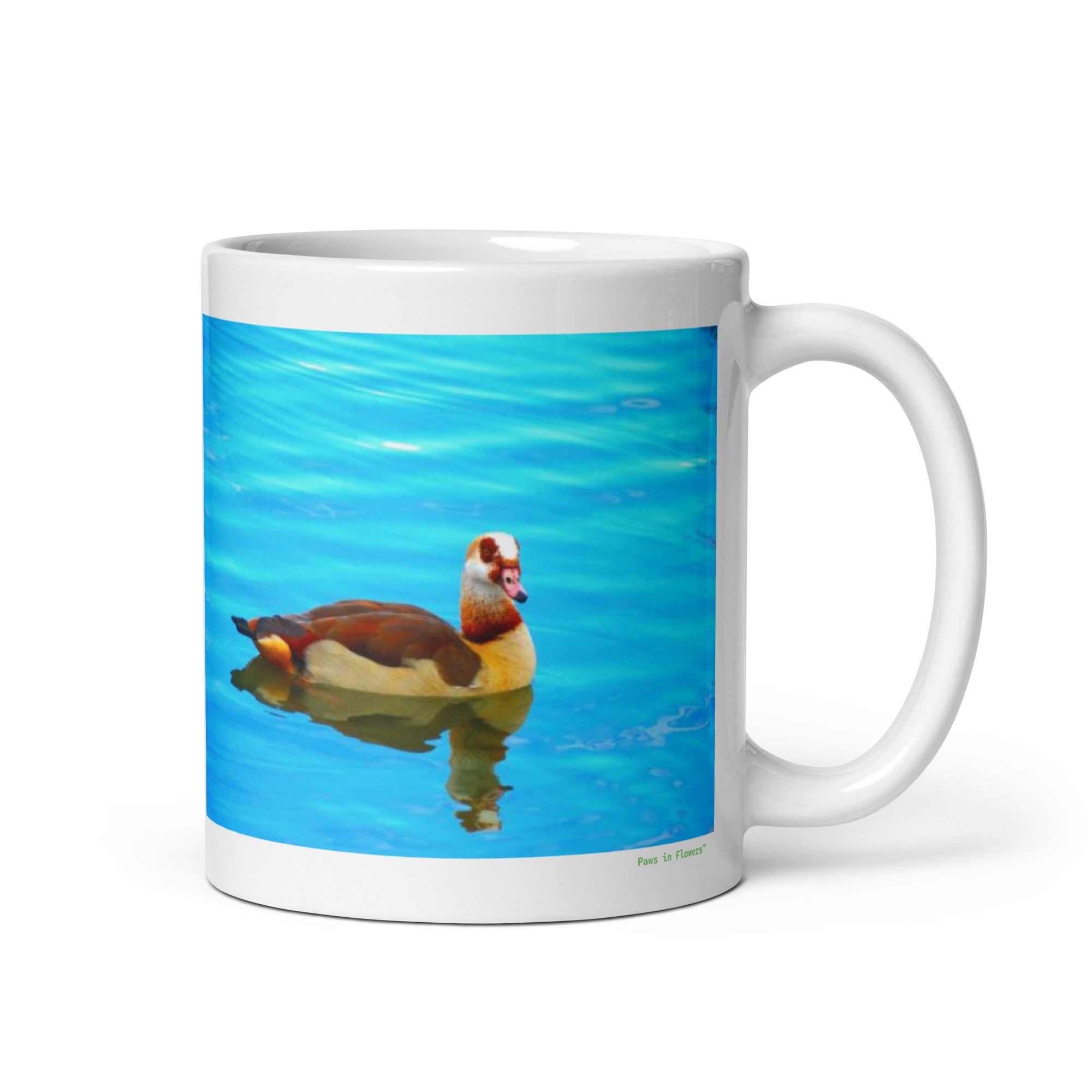 11 oz. white ceramic Egyptian goose mug showing an Egyptian goose in its natural habitat
