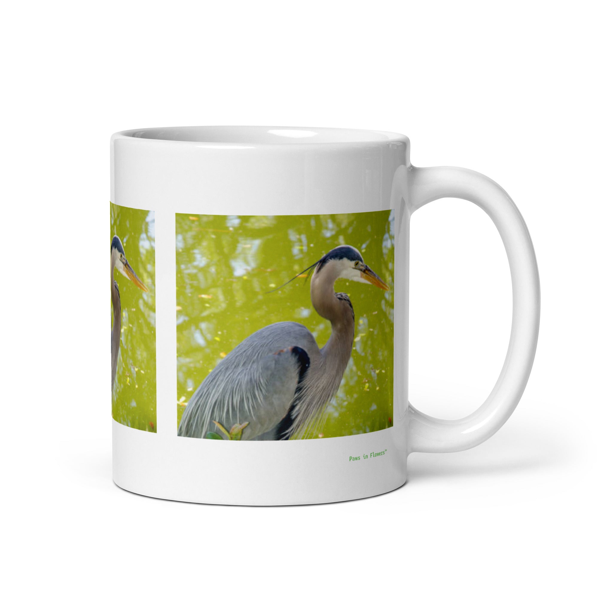 11 oz. white ceramic heron mug showing a heron in its natural habitat