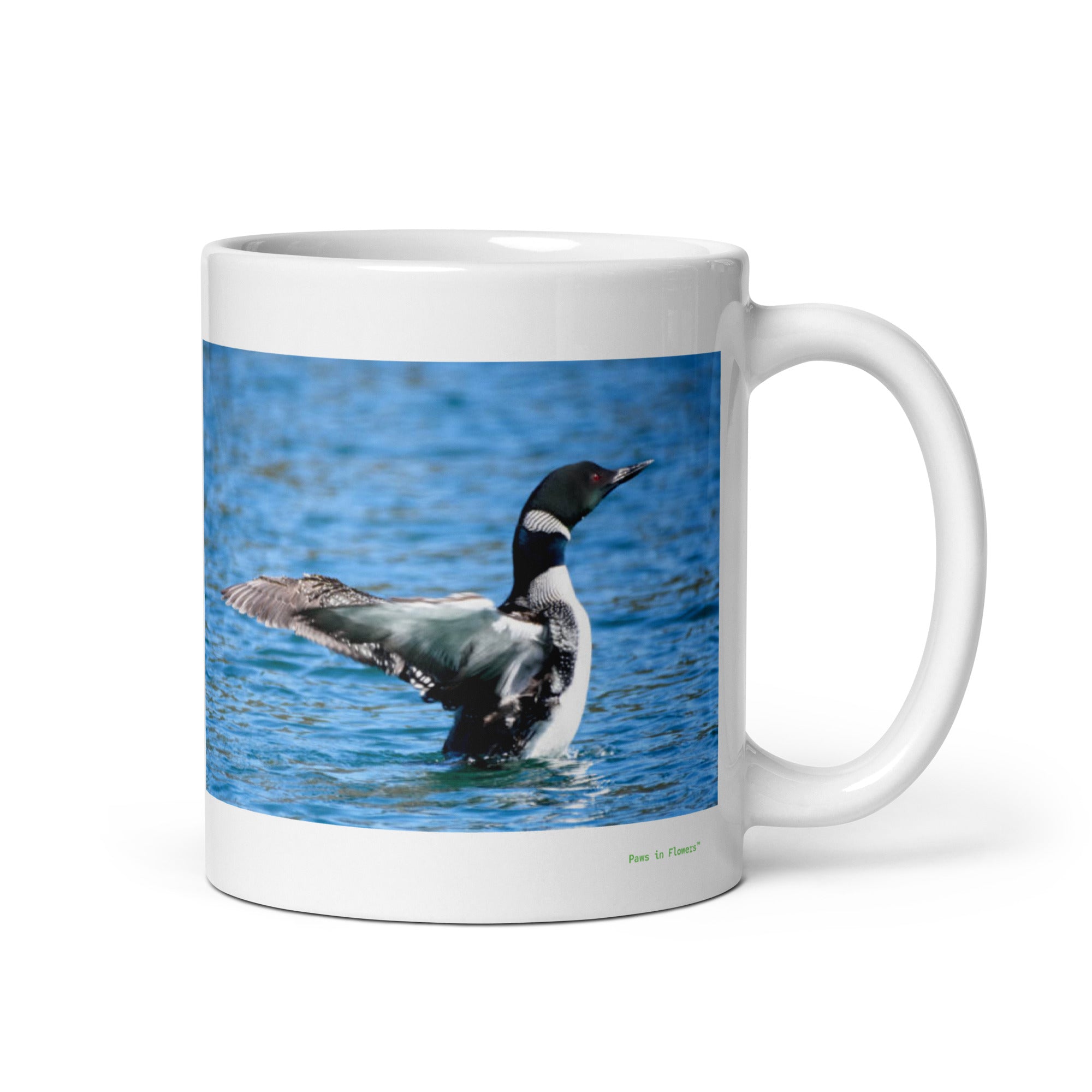 11 oz. white ceramic loon mug showing a loon in its natural habitat