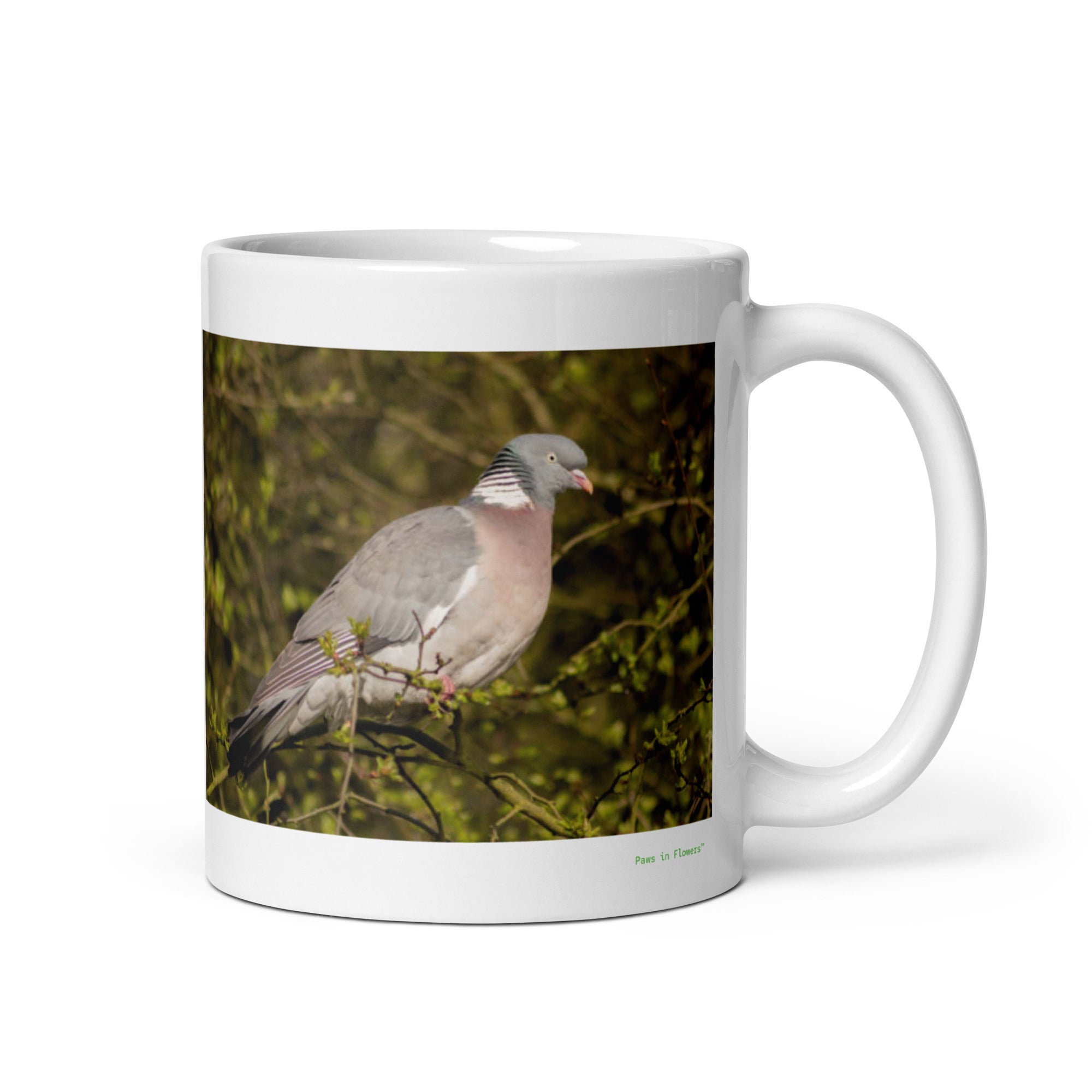 11 oz. white ceramic pigeon mug showing a pigeon in its natural habitat