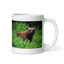 11 oz. white ceramic wolverine animal mug showing a wolverine animal in its natural habitat