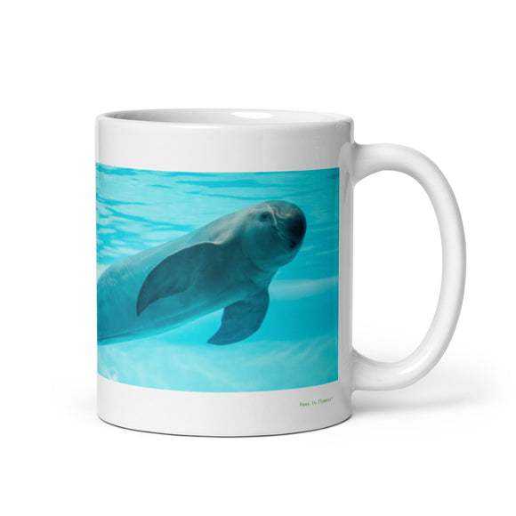 11 oz. white ceramic porpoise mug showing a porpoise in its natural habitat