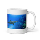 11 oz. white ceramic dolphin mug showing a dolphin in its natural habitat