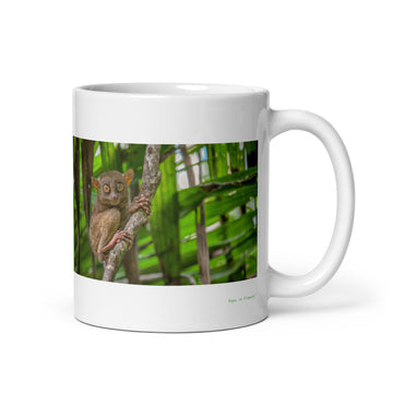 11 oz. white ceramic tarsier mug showing a tarsier in its natural habitat