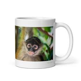 11 oz. white ceramic spider monkey mug showing a spider monkey in its natural habitat