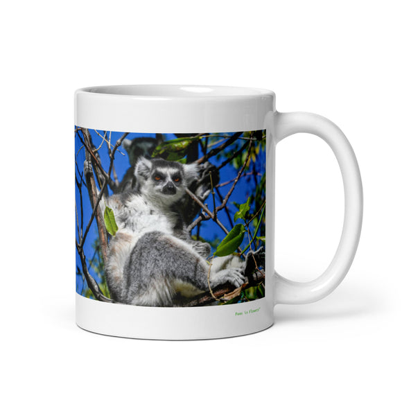 11 oz. white ceramic lemur mug showing a lemur in its natural habitat