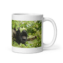 11 oz. white ceramic howler monkey mug showing a howler monkey in its natural habitat
