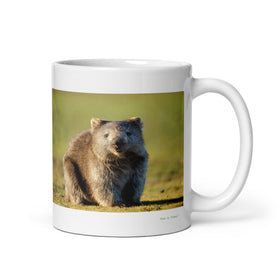 11 oz. white ceramic wombat mug showing a wombat in its natural habitat