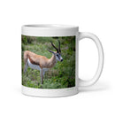 11 oz. white ceramic springbok mug showing a springbok in its natural habitat