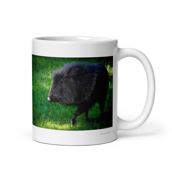 11 oz. white ceramic peccary mug showing a peccary in its natural habitat