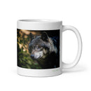11 oz. white ceramic wolf mug showing a wolf in its natural habitat