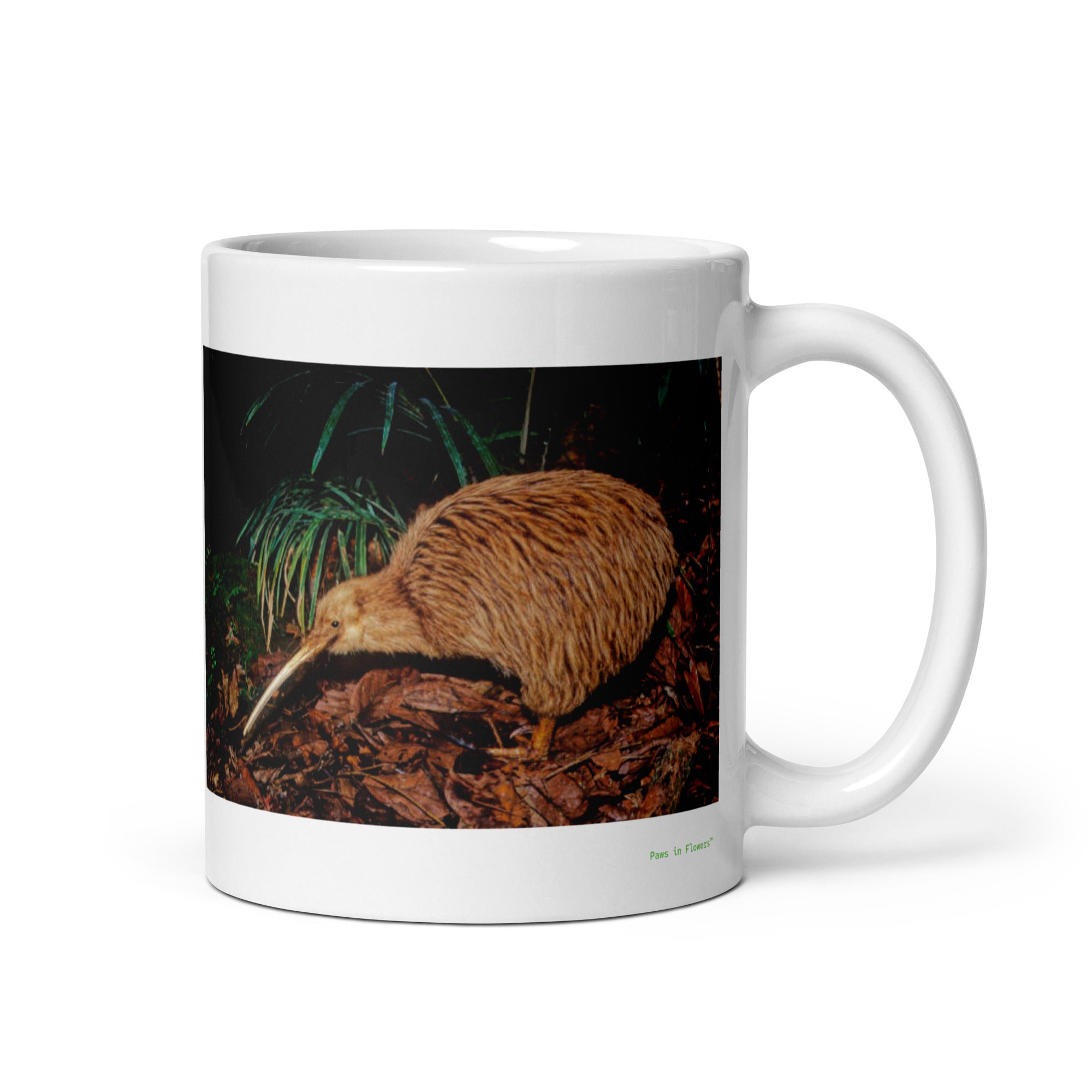 11 oz. white ceramic kiwi bird mug showing a kiwi bird in its natural habitat