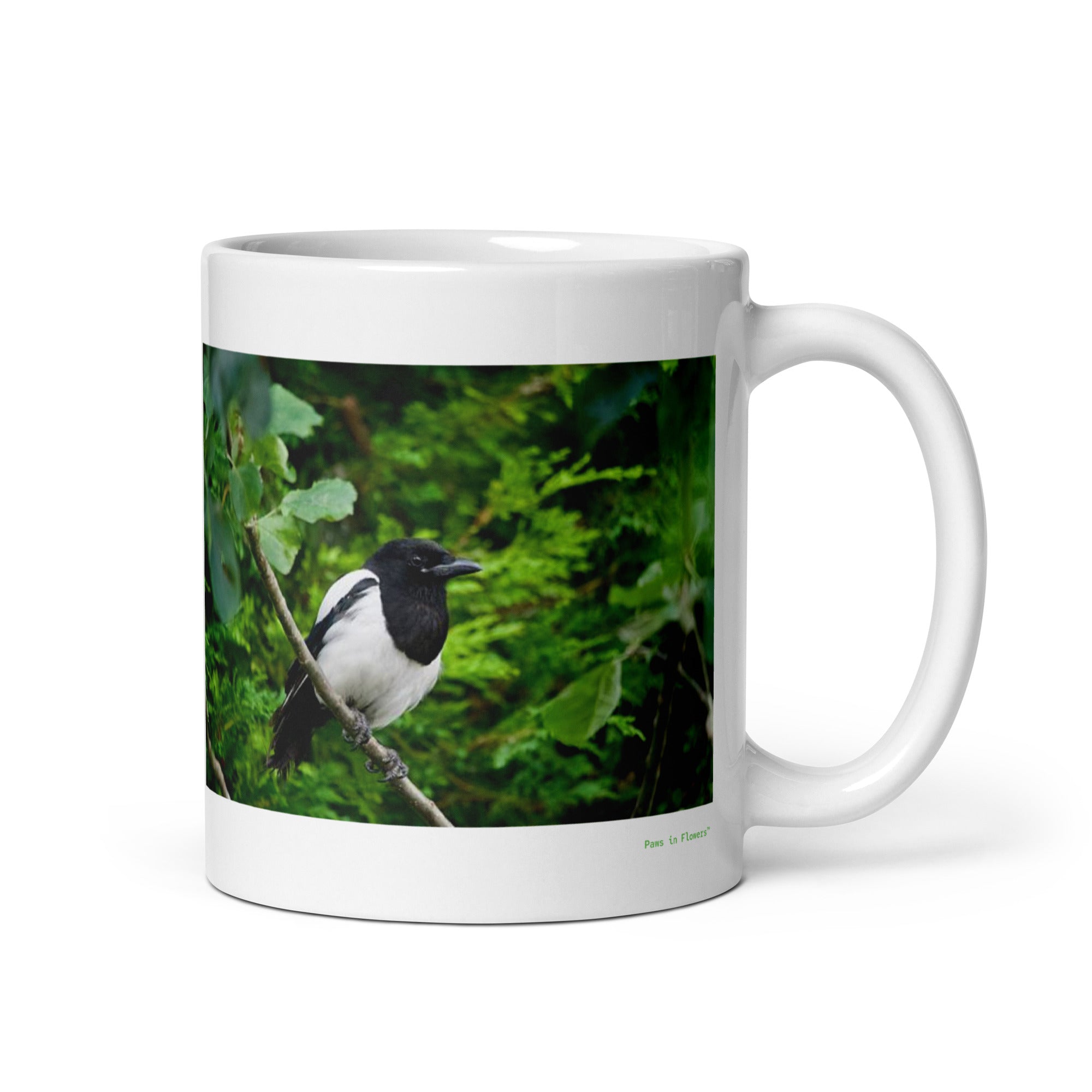 11 oz. white ceramic magpie mug showing a magpie in its natural habitat