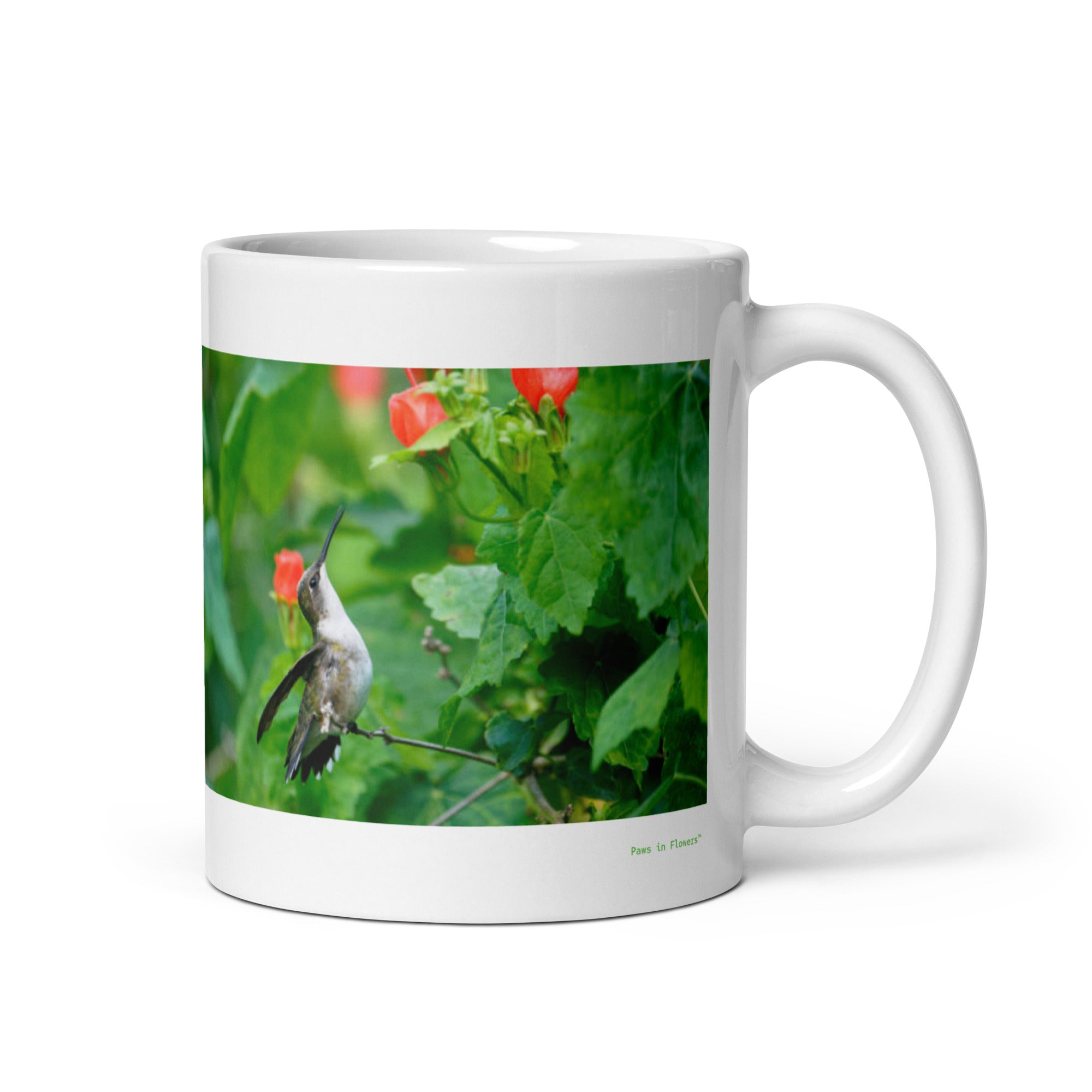 11 oz. white ceramic hummingbird mug showing a hummingbird in its natural habitat