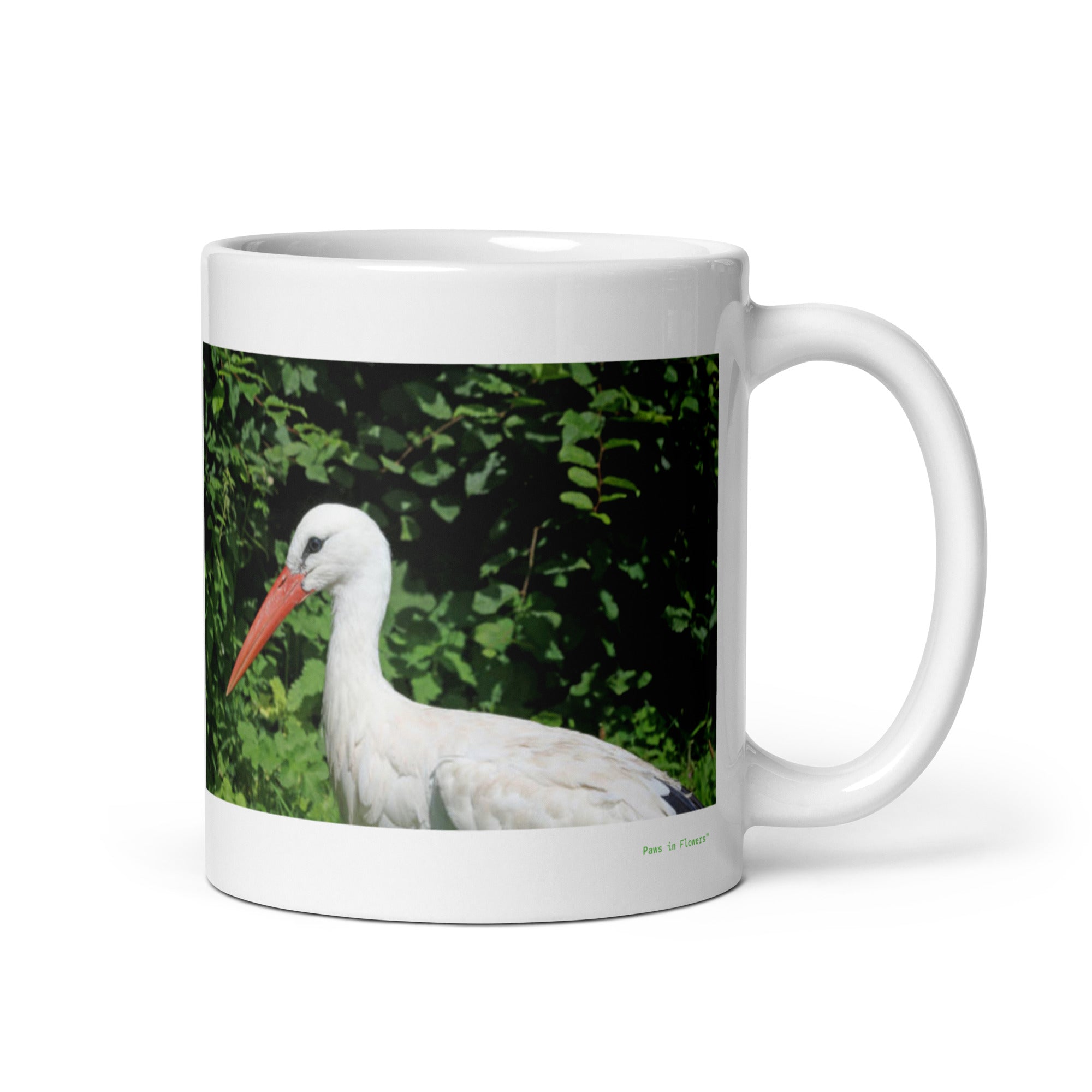 11 oz. white ceramic stork mug showing a stork in its natural habitat