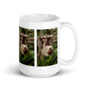 15 oz. white ceramic sloth mug showing a sloth in its natural habitat