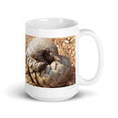15 oz. white ceramic pangolin mug showing a pangolin in its natural habitat