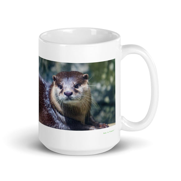 15 oz. white ceramic otter mug showing an otter in its natural habitat
