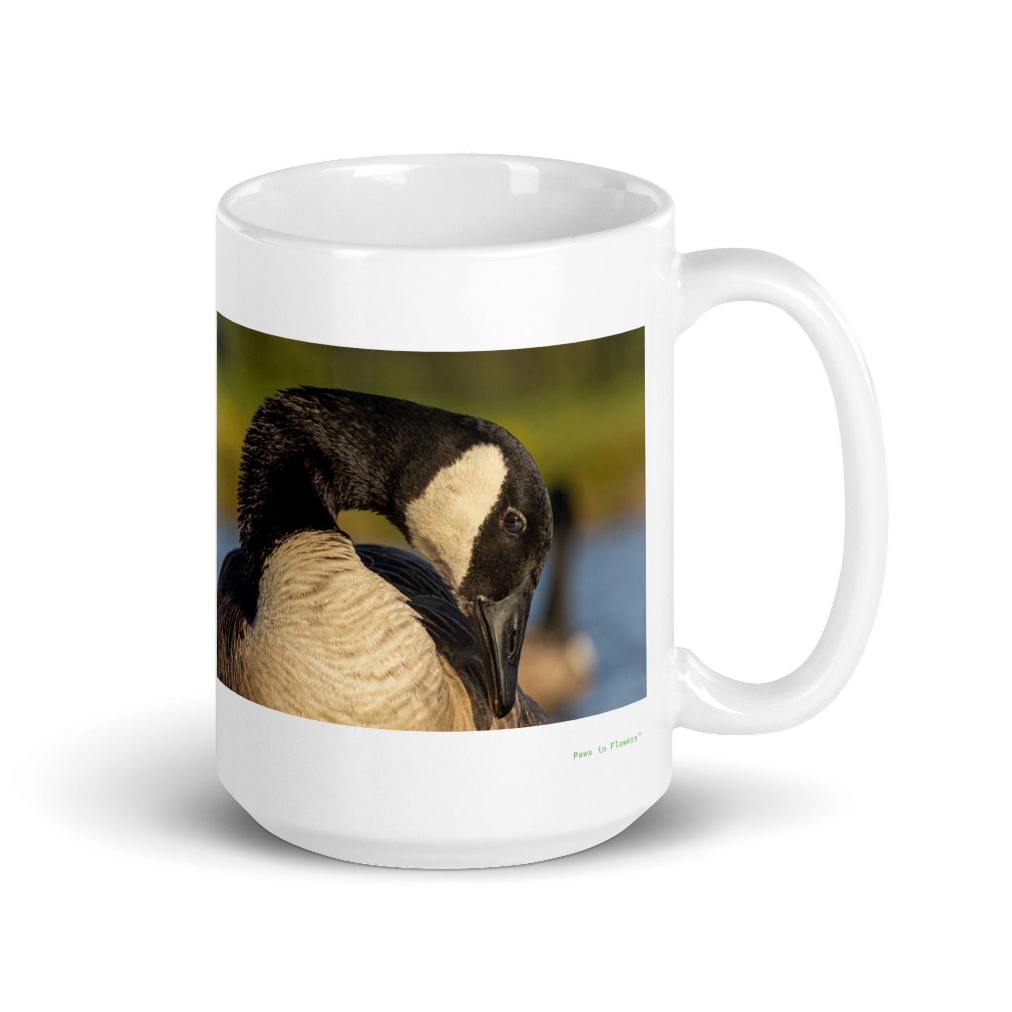 15 oz. white ceramic goose mug showing a goose in its natural habitat