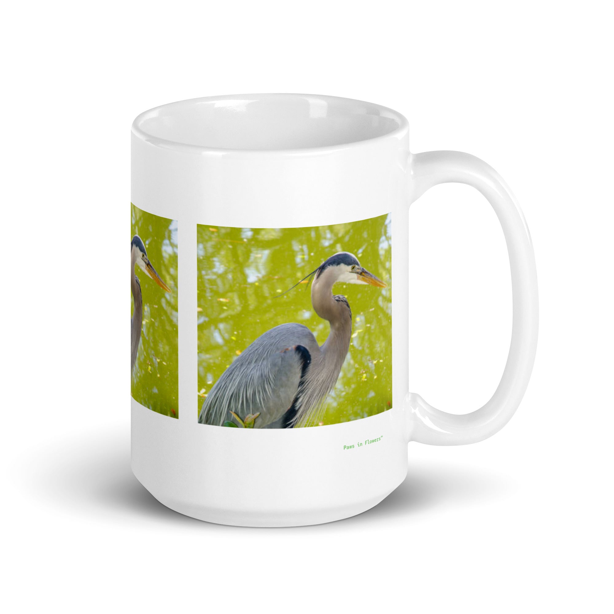 15 oz. white ceramic heron mug showing a heron in its natural habitat