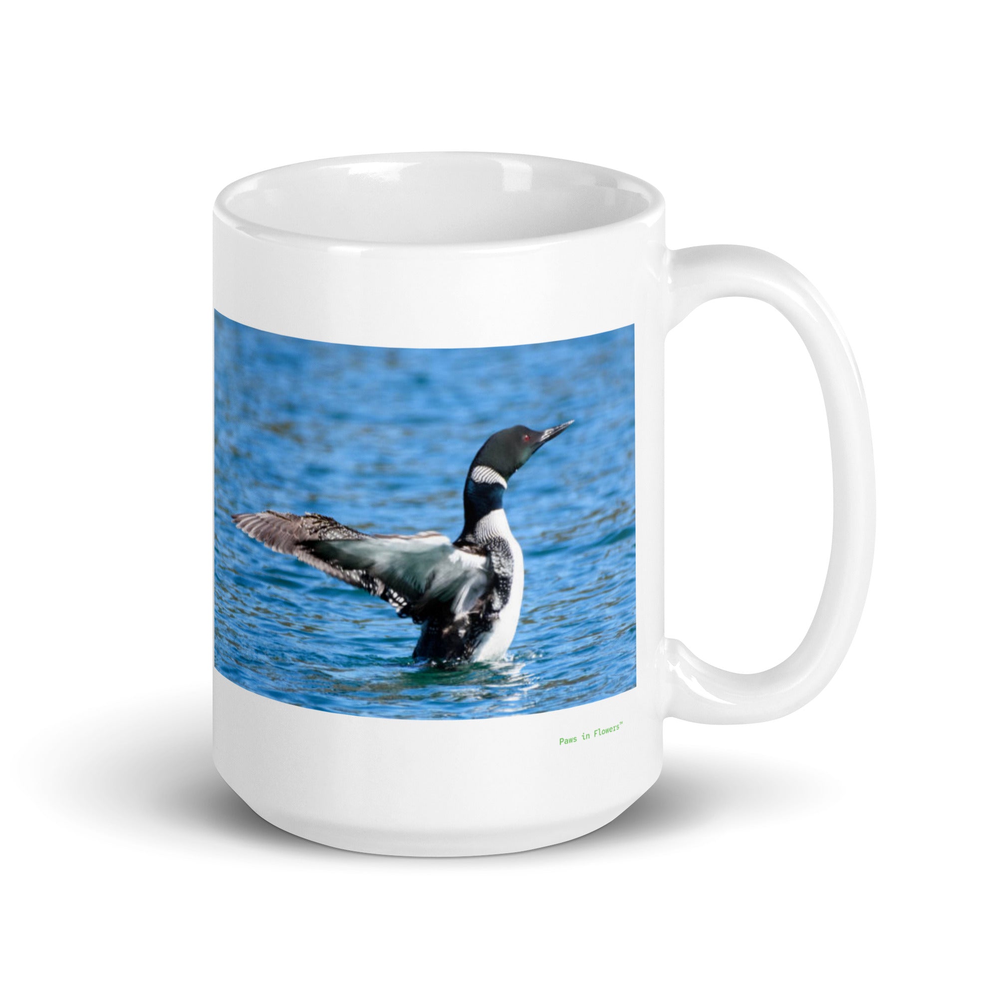 15 oz. white ceramic loon mug showing a loon in its natural habitat