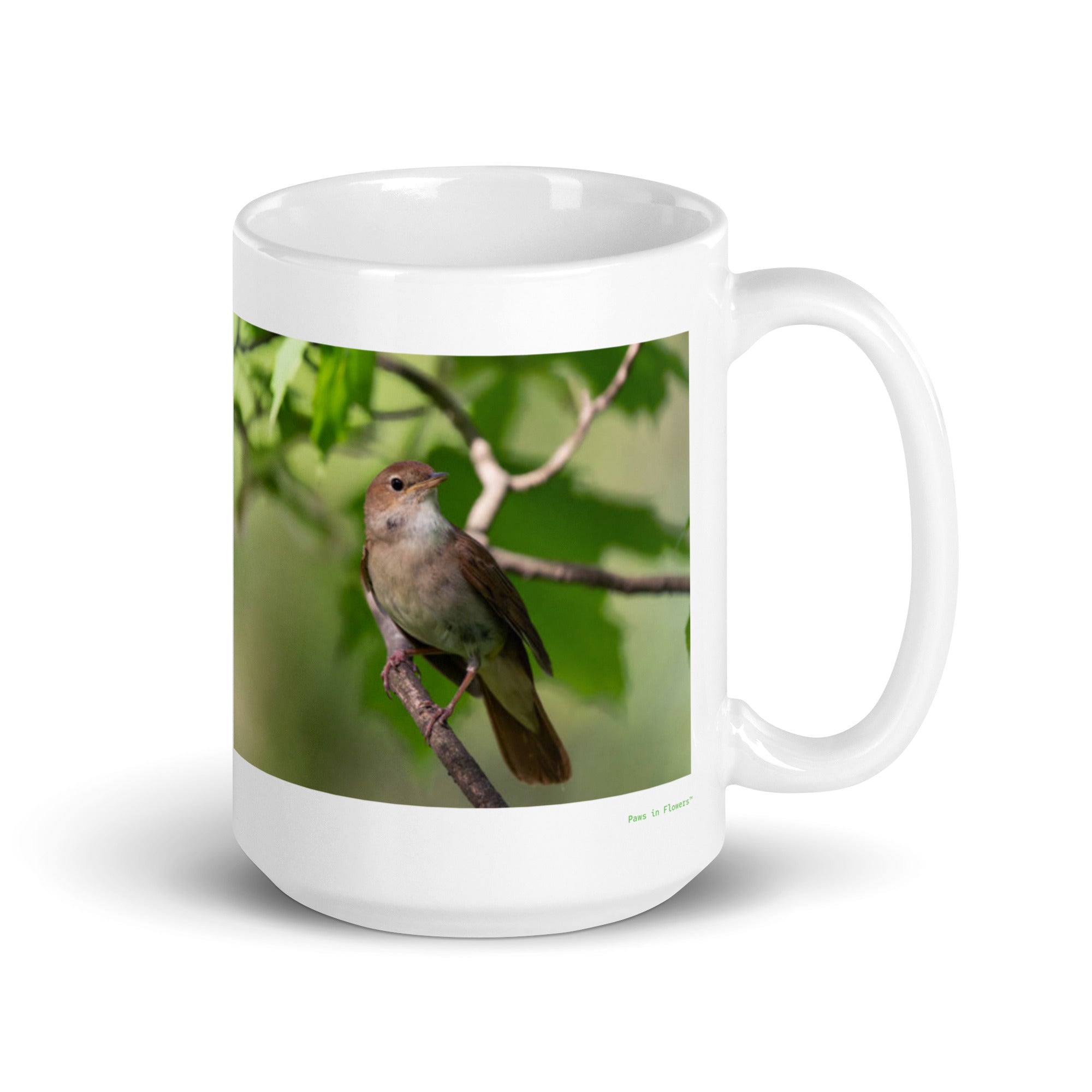 15 oz. white ceramic nightingale mug showing a nightingale in its natural habitat