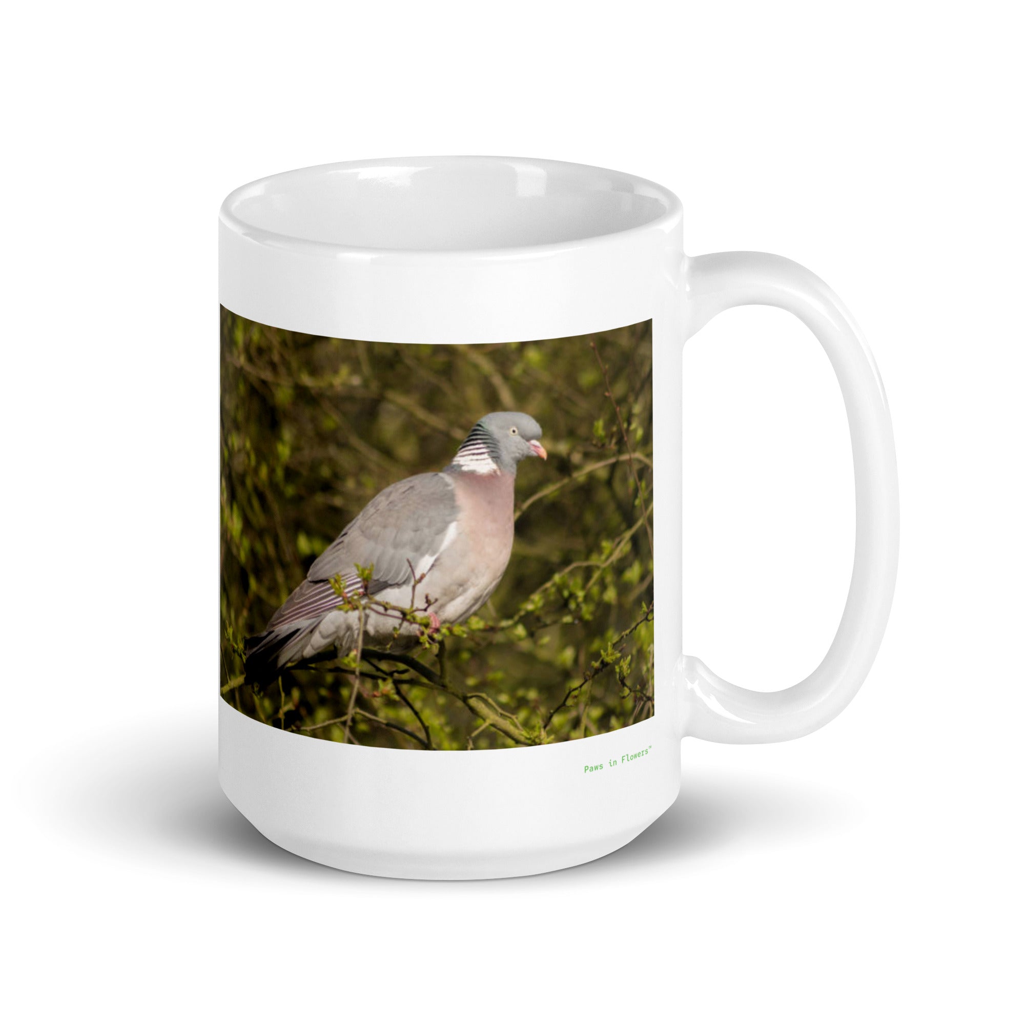 15 oz. white ceramic pigeon mug showing a pigeon in its natural habitat