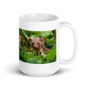 15 oz. white ceramic weasel  mug showing a weasel in its natural habitat