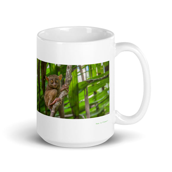 15 oz. white ceramic tarsier mug showing a tarsier in its natural habitat