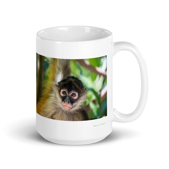 15 oz. white ceramic spider monkey mug showing a spider monkey in its natural habitat