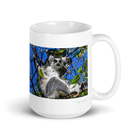15 oz. white ceramic lemur mug showing a lemur in its natural habitat