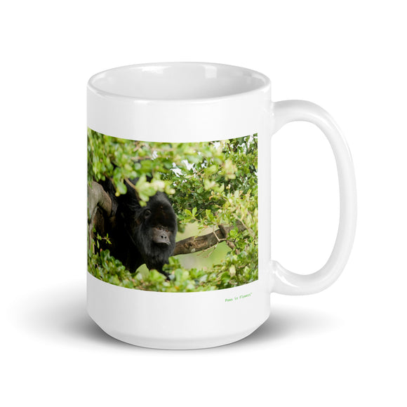 15 oz. white ceramic howler monkey mug showing a howler monkey in its natural habitat