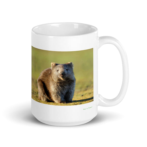15 oz. white ceramic wombat mug showing a wombat in its natural habitat