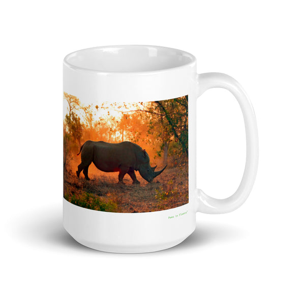 15 oz. white ceramic rhinoceros mug showing a rhinoceros in its natural habitat