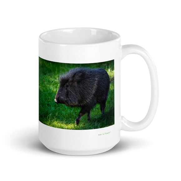 15 oz. white ceramic peccary mug showing a peccary in its natural habitat