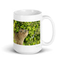 15 oz. white ceramic hyrax mug showing a hyrax in its natural habitat