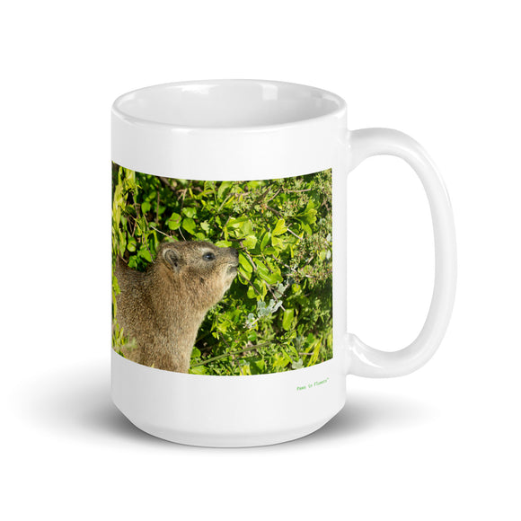 15 oz. white ceramic hyrax mug showing a hyrax in its natural habitat