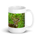 15 oz. white ceramic deer mug showing a deer in its natural habitat