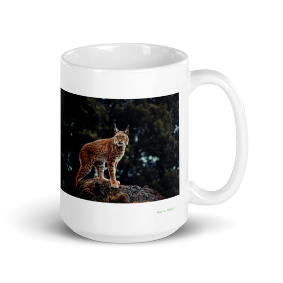15 oz. white ceramic lynx mug showing a lynx in its natural habitat
