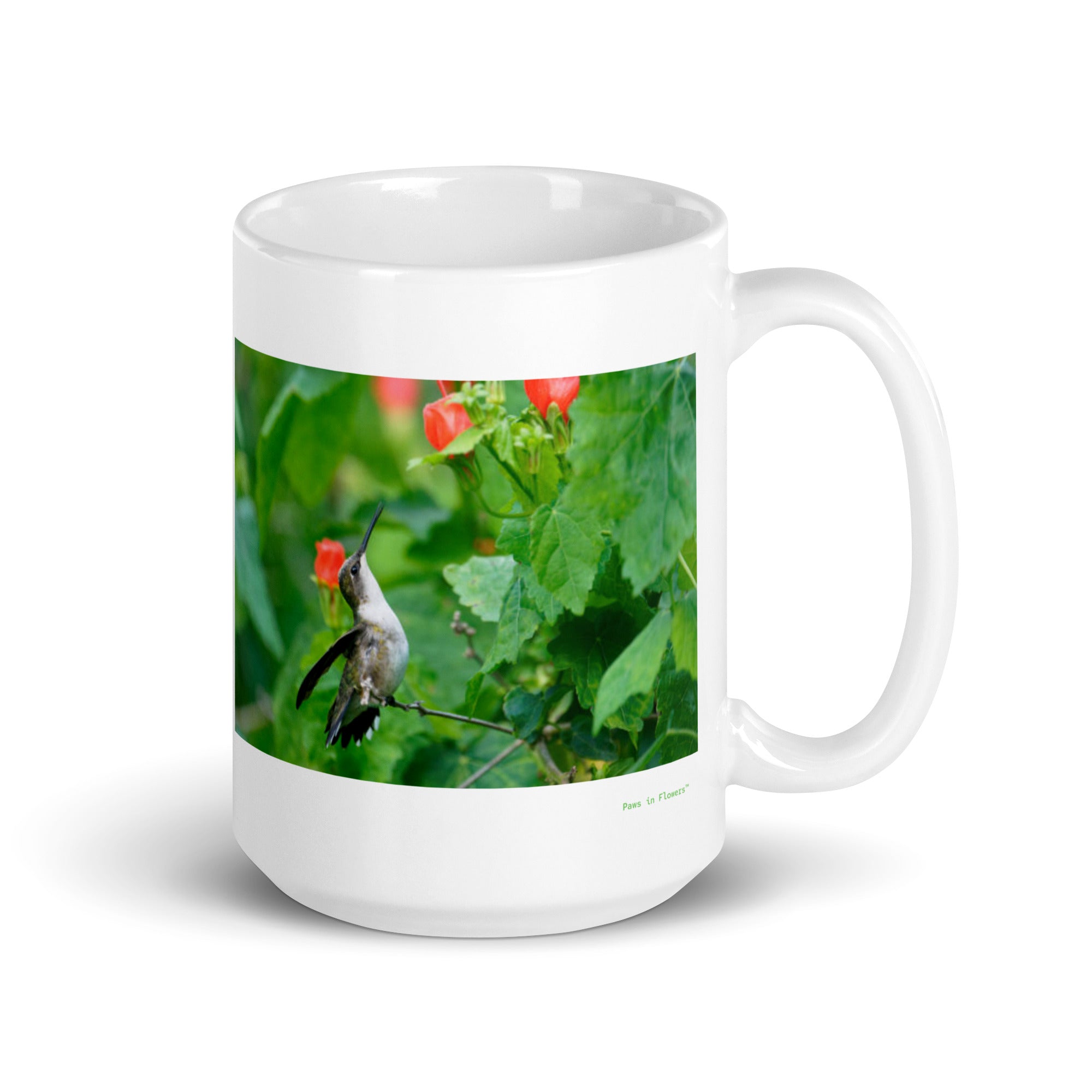 15 oz. white ceramic hummingbird mug showing a hummingbird in its natural habitat