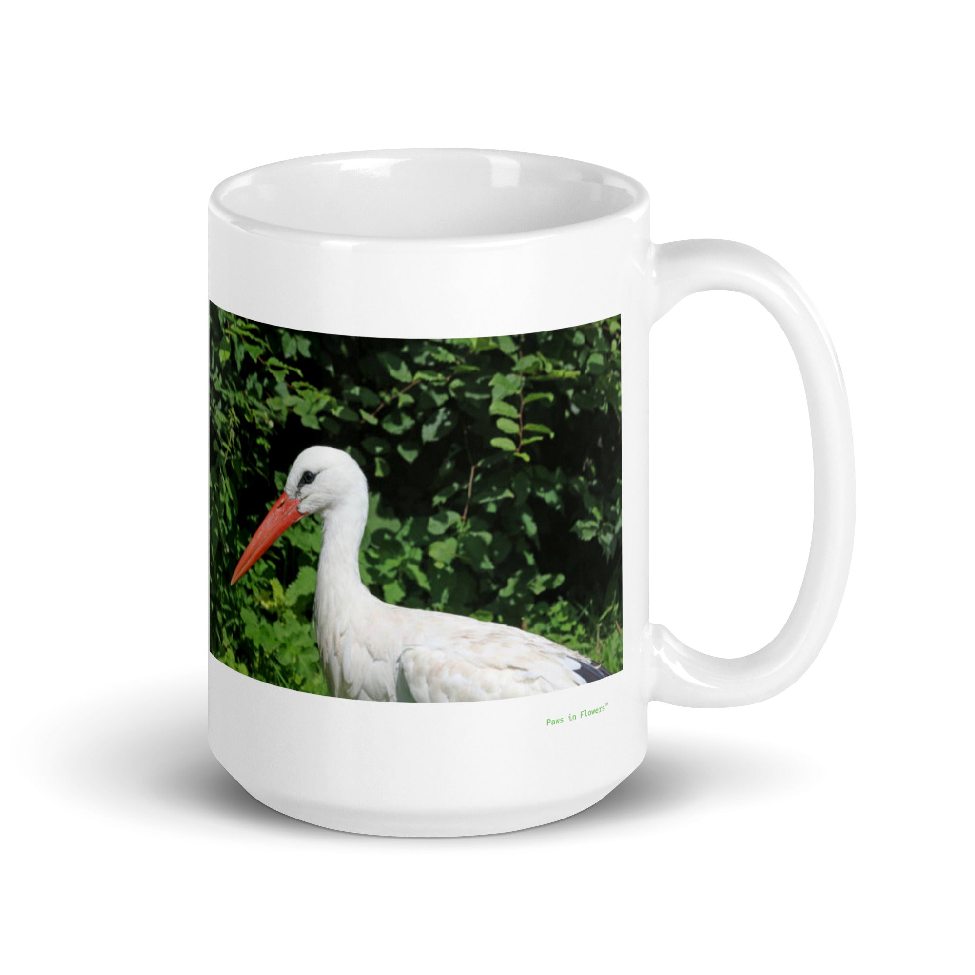 15 oz. white ceramic stork mug showing a stork in its natural habitat