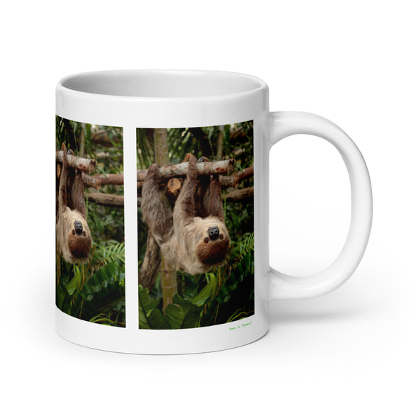 20 oz. white ceramic sloth mug showing a sloth in its natural habitat