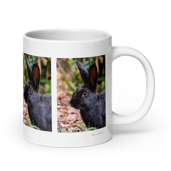 20 oz. white ceramic riverine rabbit mug showing a riverine rabbit in its natural habitat