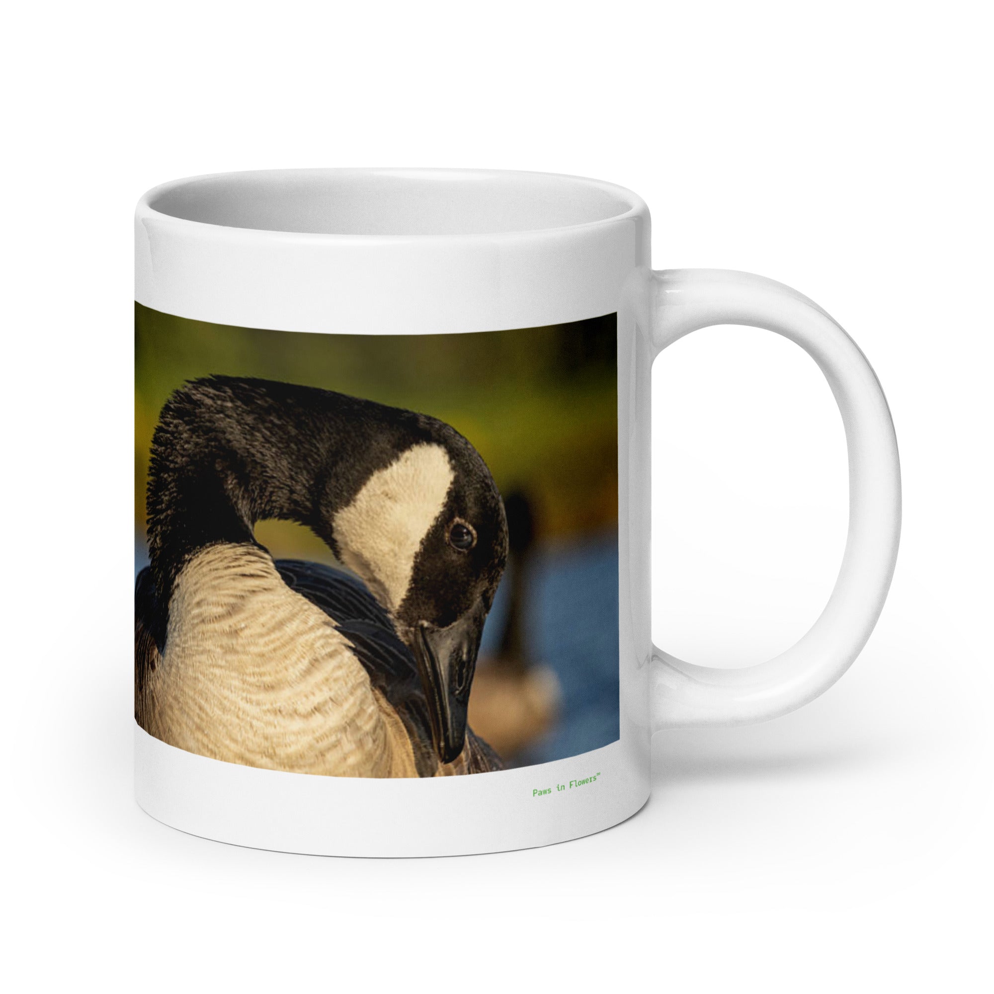 20 oz. white ceramic goose mug showing a goose in its natural habitat