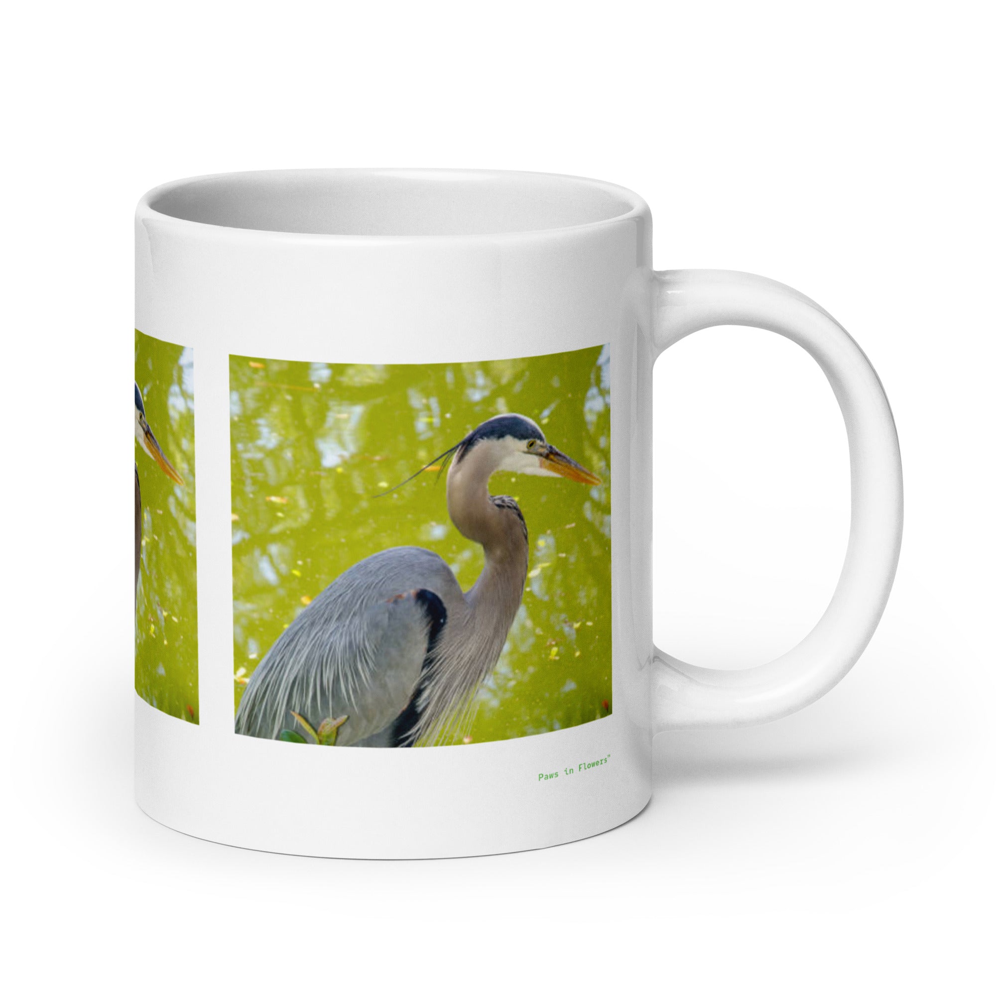 20 oz. white ceramic heron mug showing a heron in its natural habitat