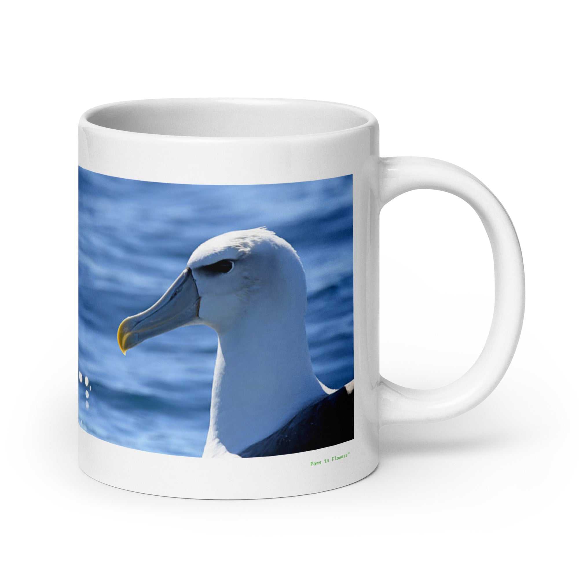 20 oz. white ceramic albatross mug showing an albatross in its natural habitat