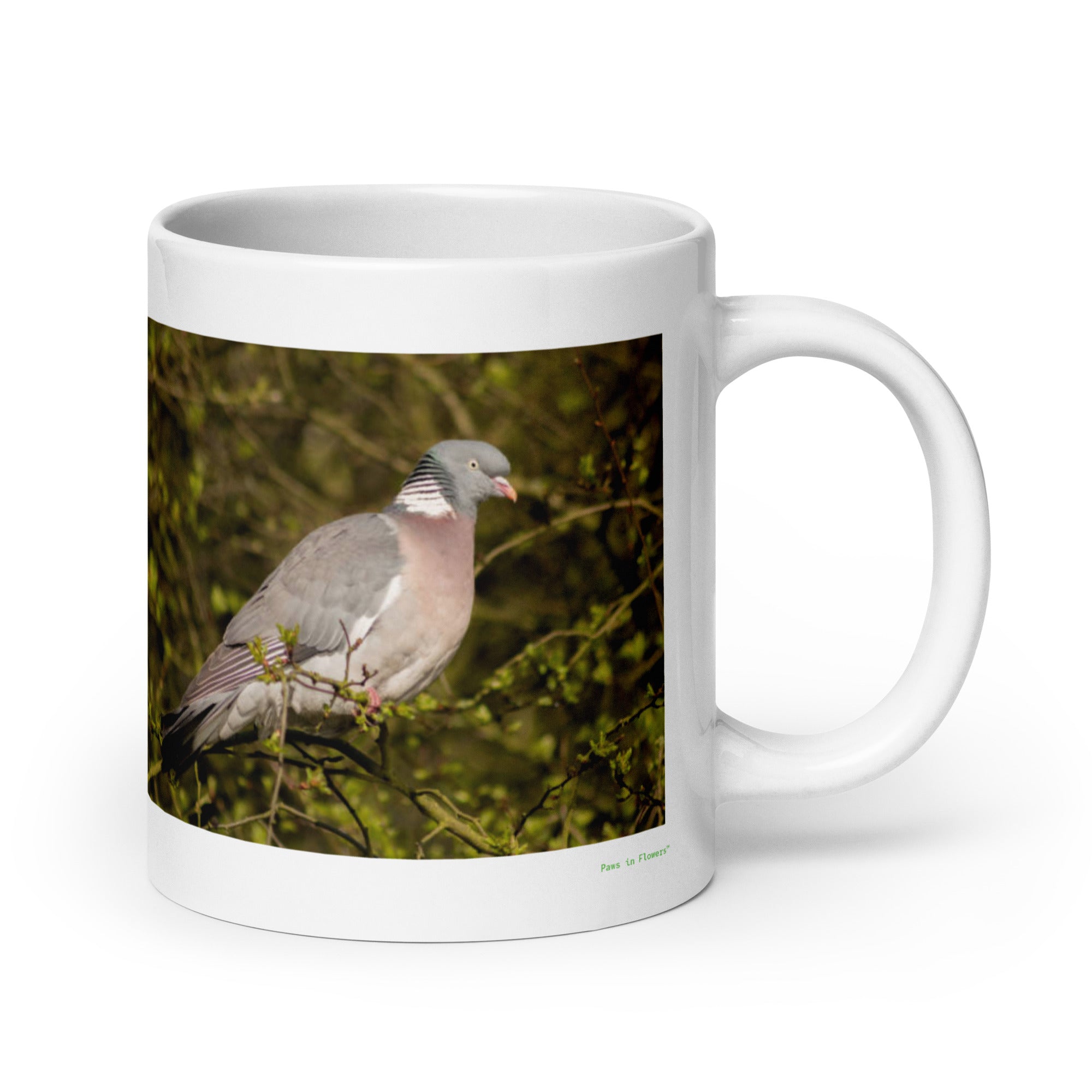 20 oz. white ceramic pigeon mug showing a pigeon in its natural habitat