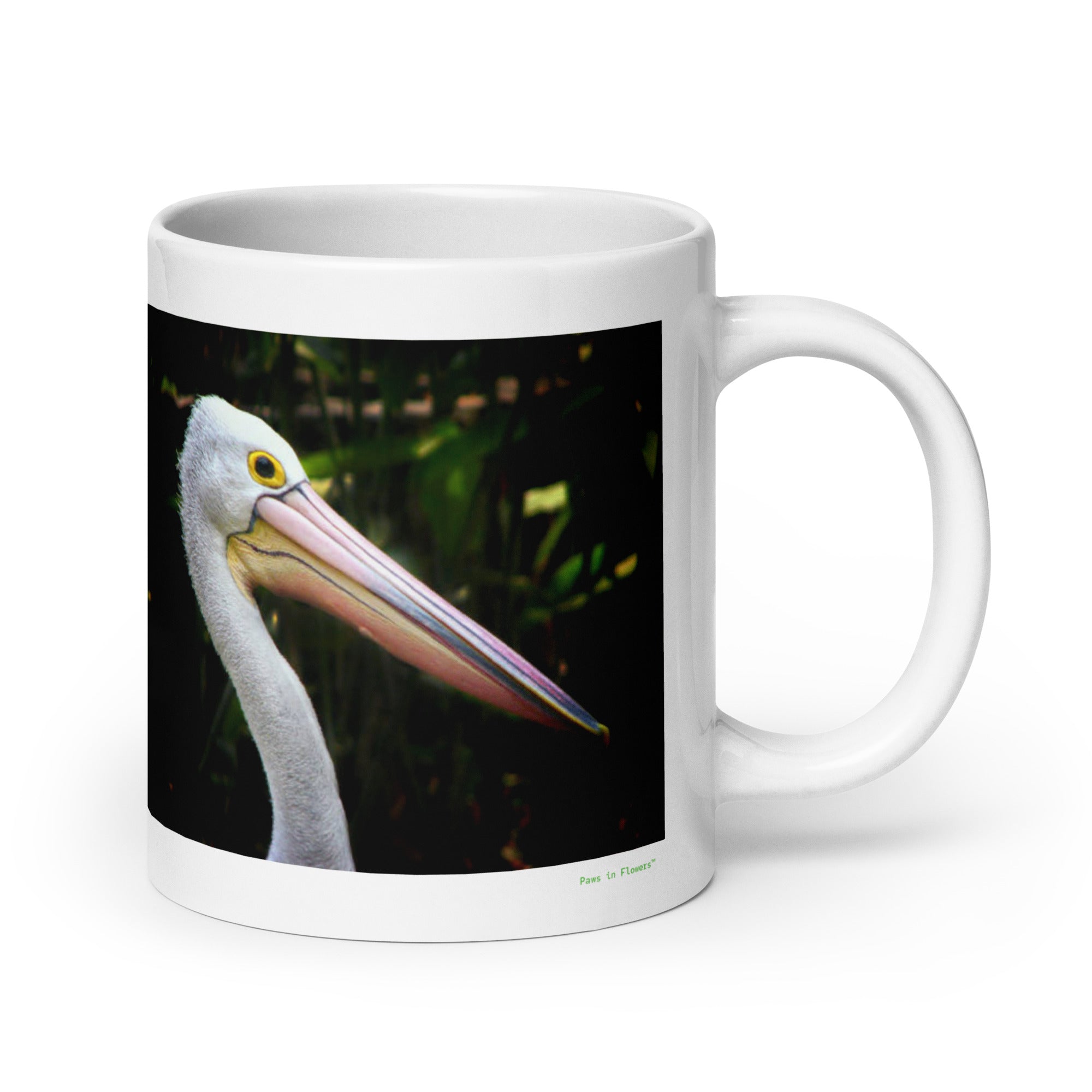 20 oz. white ceramic pelican mug showing a pelican in its natural habitat